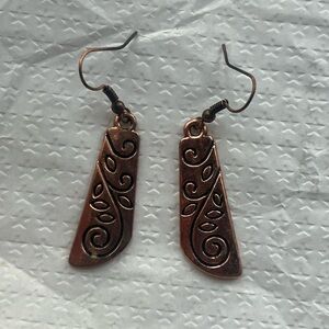 Copper colored Dangle earrings with floral design